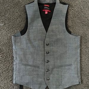 Dress shirts and a suit vest
